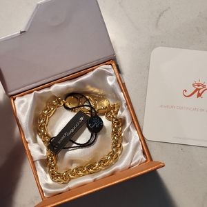 Gender neutral, new, with tags, box, coa. Joseph Nogucci Gold Handcuff Bracelet.